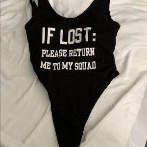 Black one piece suit